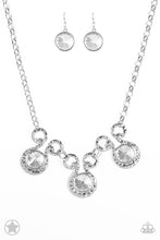 Load image into Gallery viewer, Three dramatically oversized rhinestones are nestled into three textured silver fittings that are connected by oval silver rings, creating a brilliant statement piece. Features an adjustable clasp closure.  Sold as one individual necklace. Includes one pair of matching earrings.
